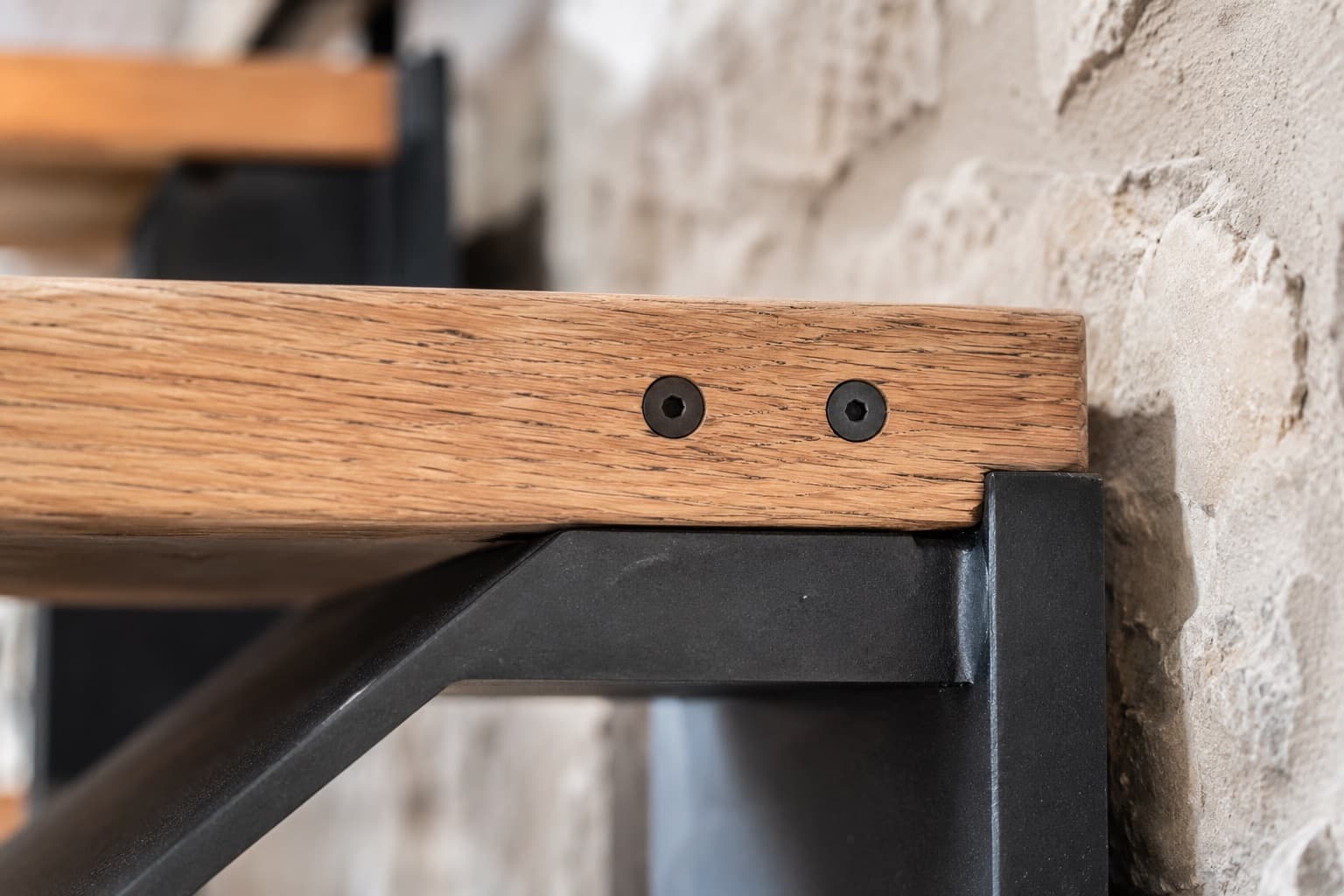 Oak and blackened steel, detailed to be seen.
